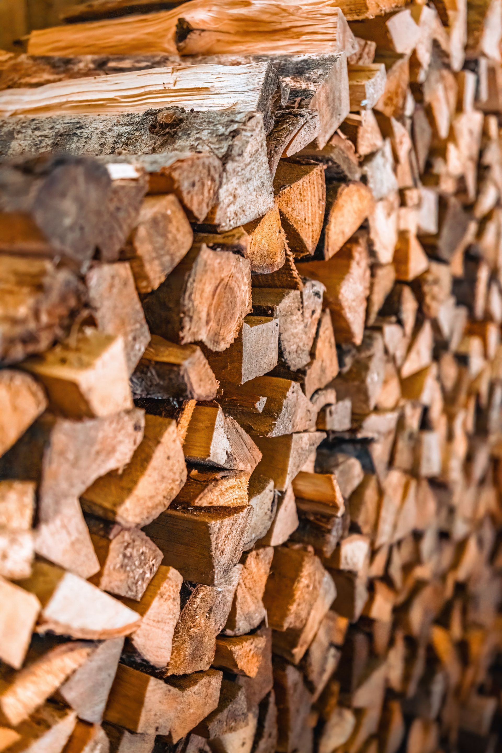 Pile of Stacked Firewood — Sly Bros in Tweed Heads, NSW