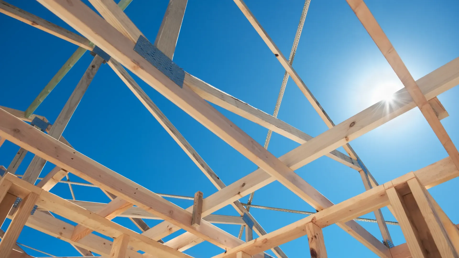 Wooden House Frame Against a Bright Blue Sky — Sly Bros in Woodburn, NSW