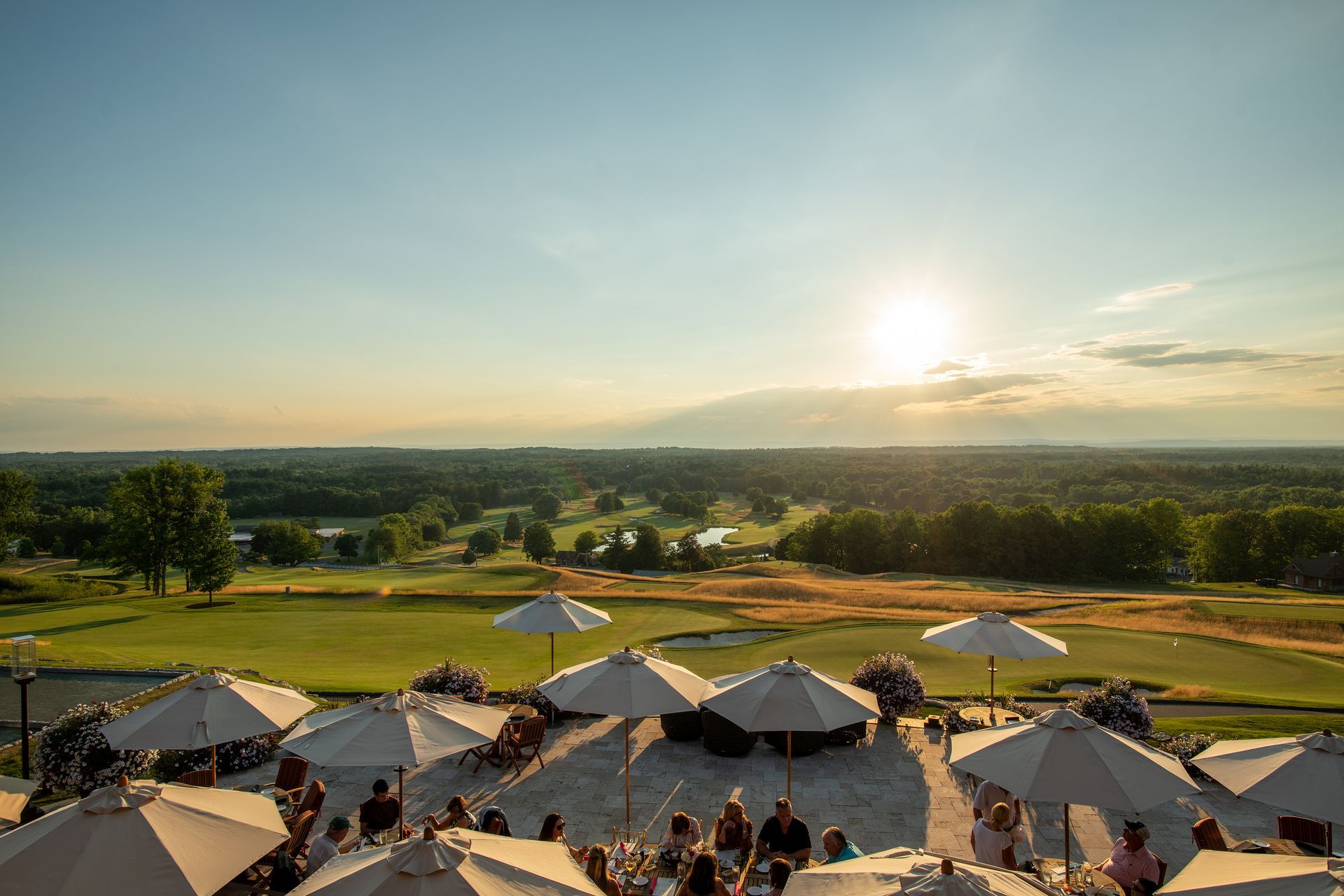 GreatHorse patio overlooking the golf course with sunset views