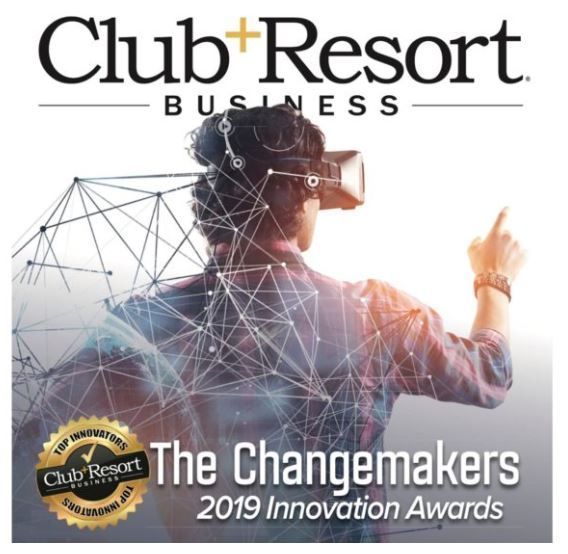 A man wearing a virtual reality headset is on the cover of club resort business