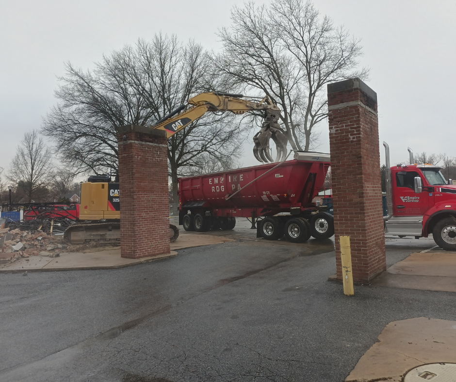 One of DVC's dump trailers being loaded up at the Springfield Municipal Building demolition. 