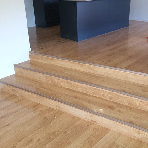 Hybrid Flooring On Stairs — Geoff Thompson's Independent Flooring Centre In Port Macquarie, NSW Hybrid Flooring On Stairs — Geoff Thompson's Independent Flooring Centre In Port Macquarie, NSW