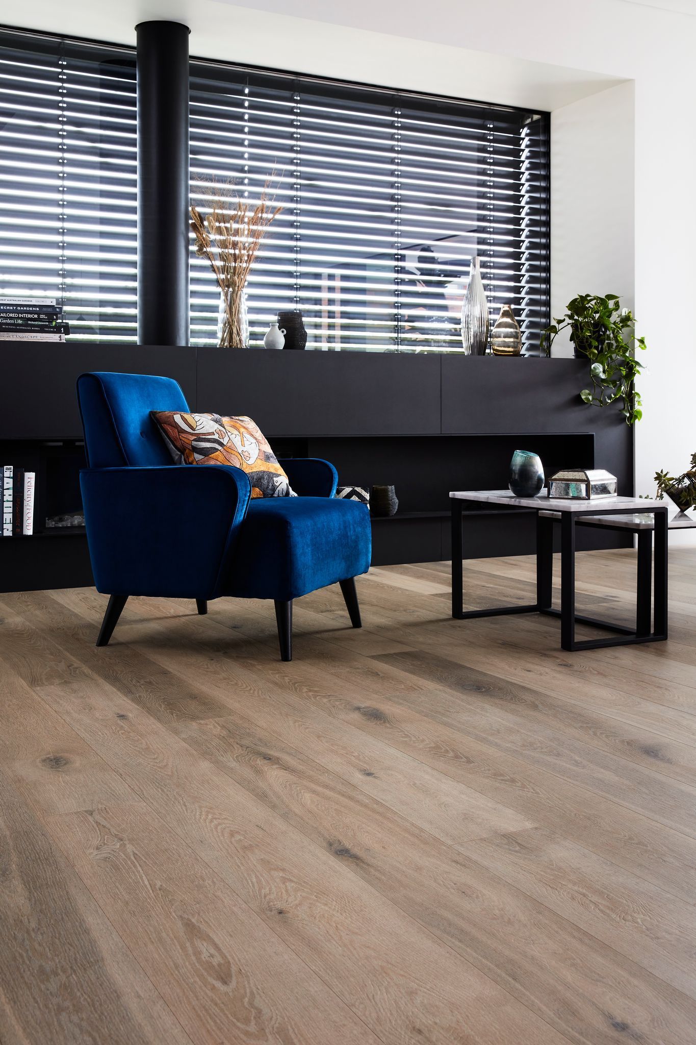 A Living Room with A Blue Chair and A Coffee Table — Geoff Thompson's Independent Flooring Centre In Port Macquarie, NSW