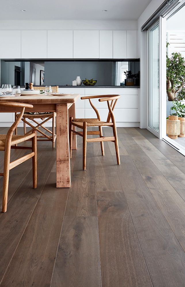 A Dining Room With A Wooden Table — Geoff Thompson's Independent Flooring Centre In Port Macquarie, NSW