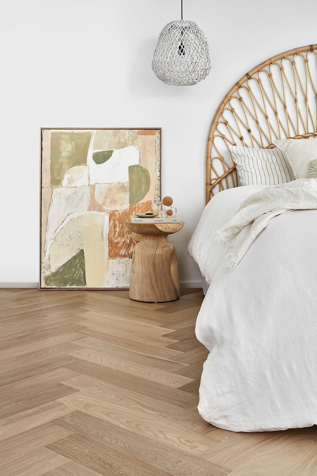 A Bedroom With A Wicker Headboard — Geoff Thompson's Independent Flooring Centre In Port Macquarie, NSW