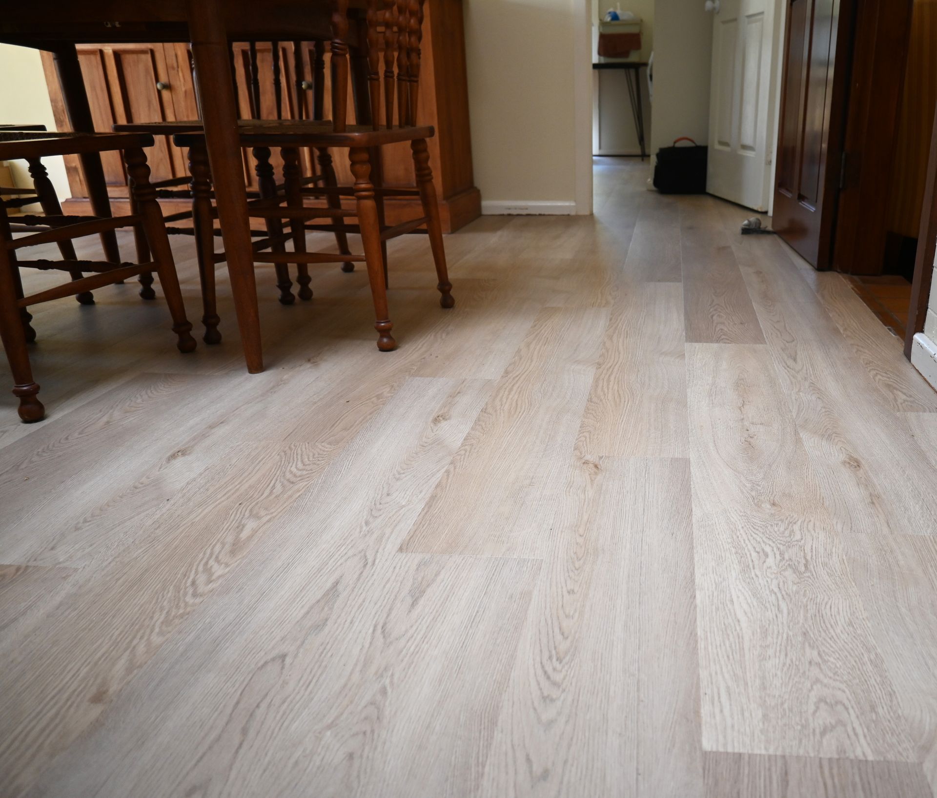 A Dining Room with A Wooden Table and Chairs — Geoff Thompson's Independent Flooring Centre In Port Macquarie, NSW