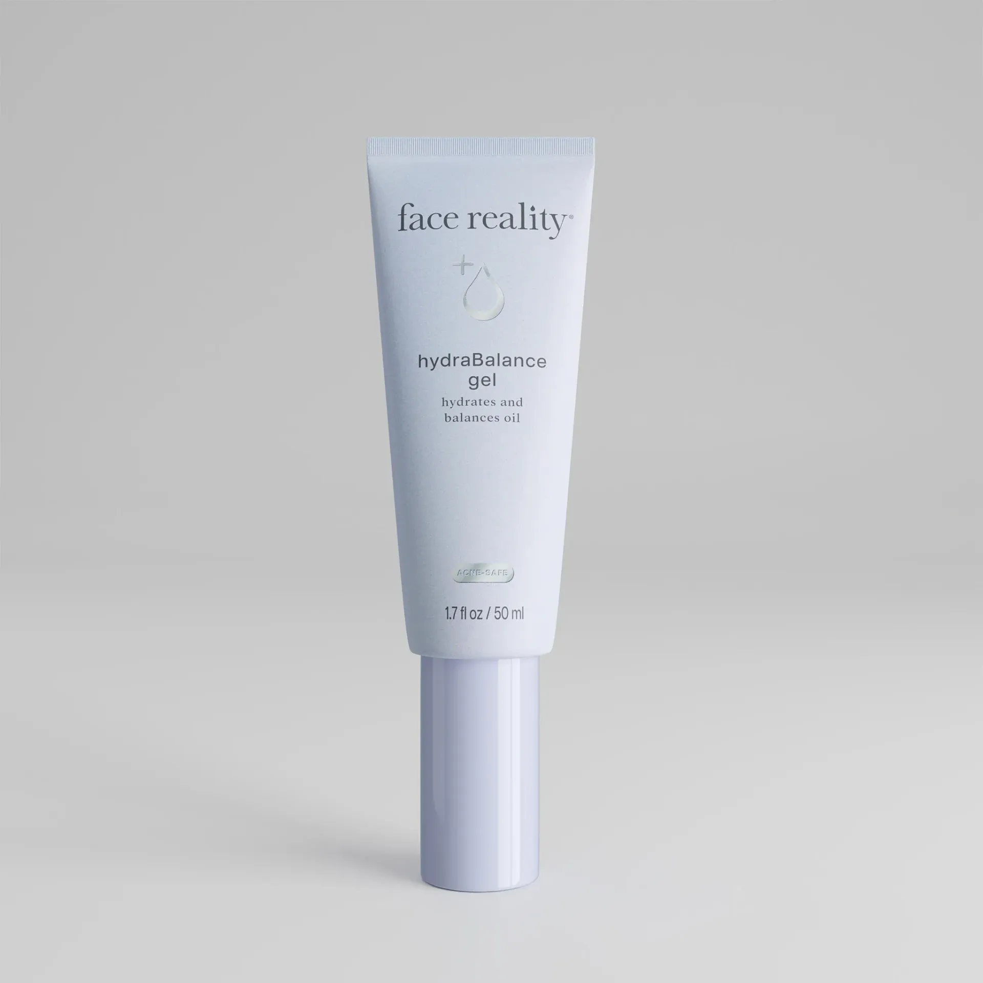 A white tube with face reality written on it