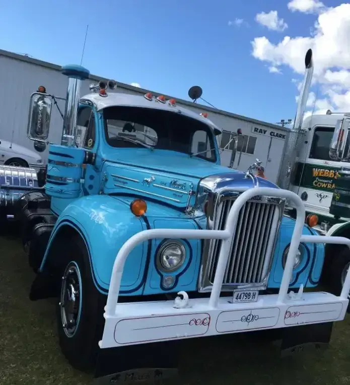 Blue Truck With a White Bumper is Parked Next to Another Truck — Transforce in Gilgandra, NSW