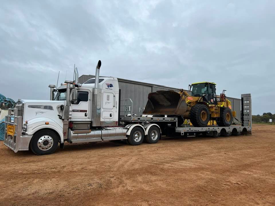 Semi Truck is Carrying a Bulldozer on a Trailer — Transforce in Narromine, NSW