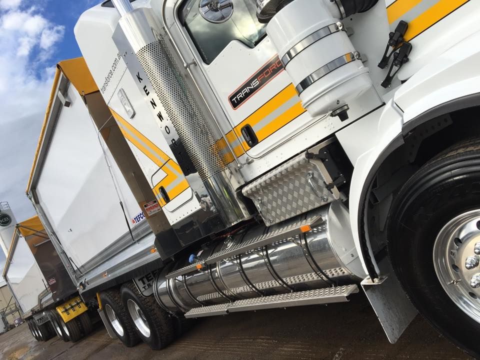 White and Yellow Semi Truck is Parked in a Parking Lot — Transforce in Mudgee, NSW