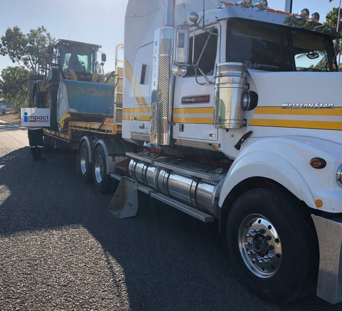 White Semi Truck is Parked Next to a Dump Truck — Transforce in Cobar, NSW