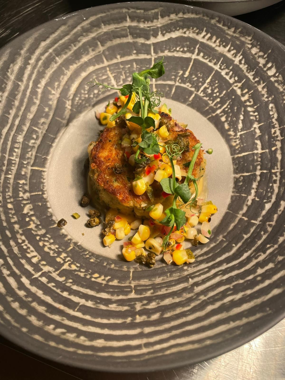A close up of a plate of food on a table.