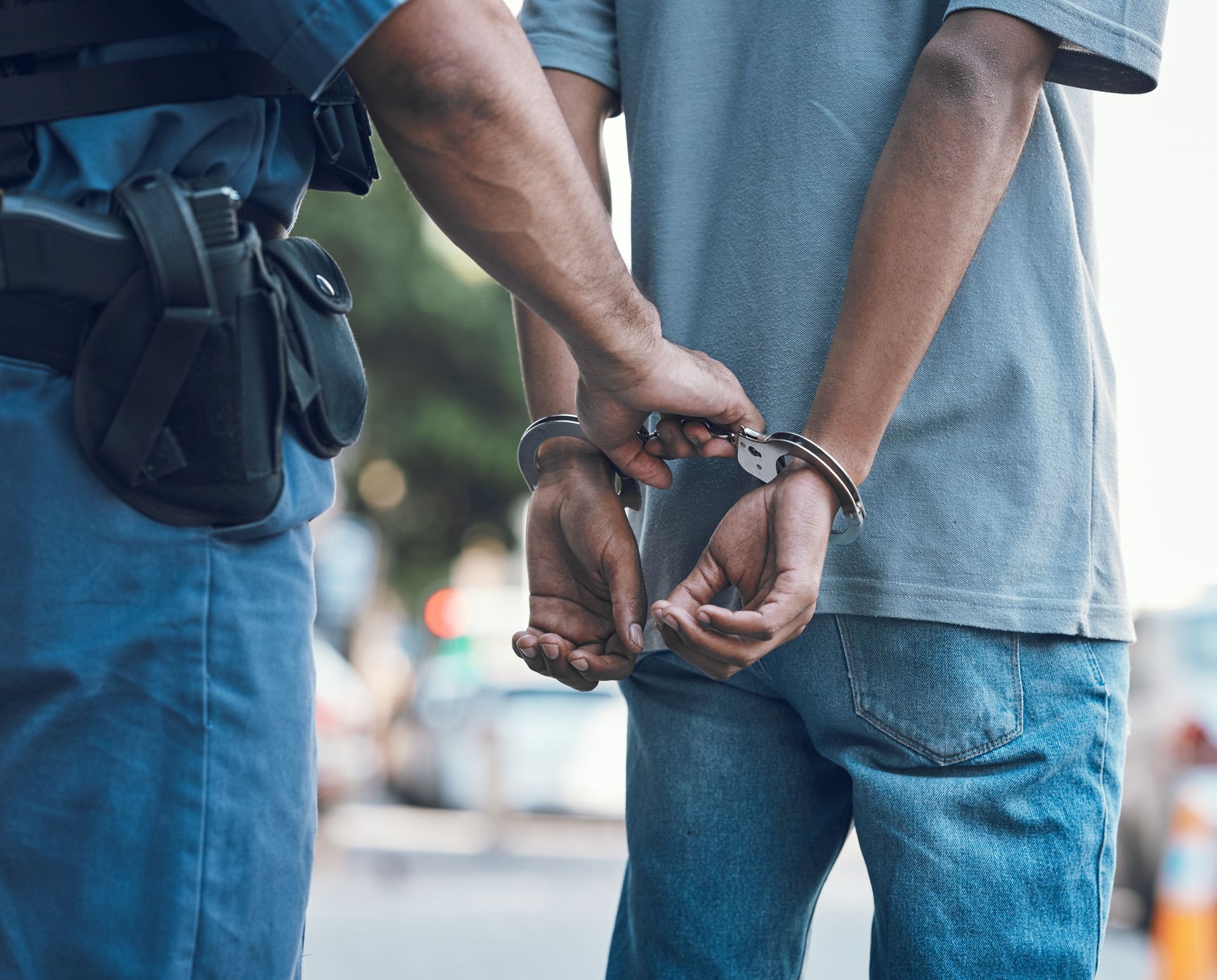 arrested man in handcuffs arrested man in handcuffs