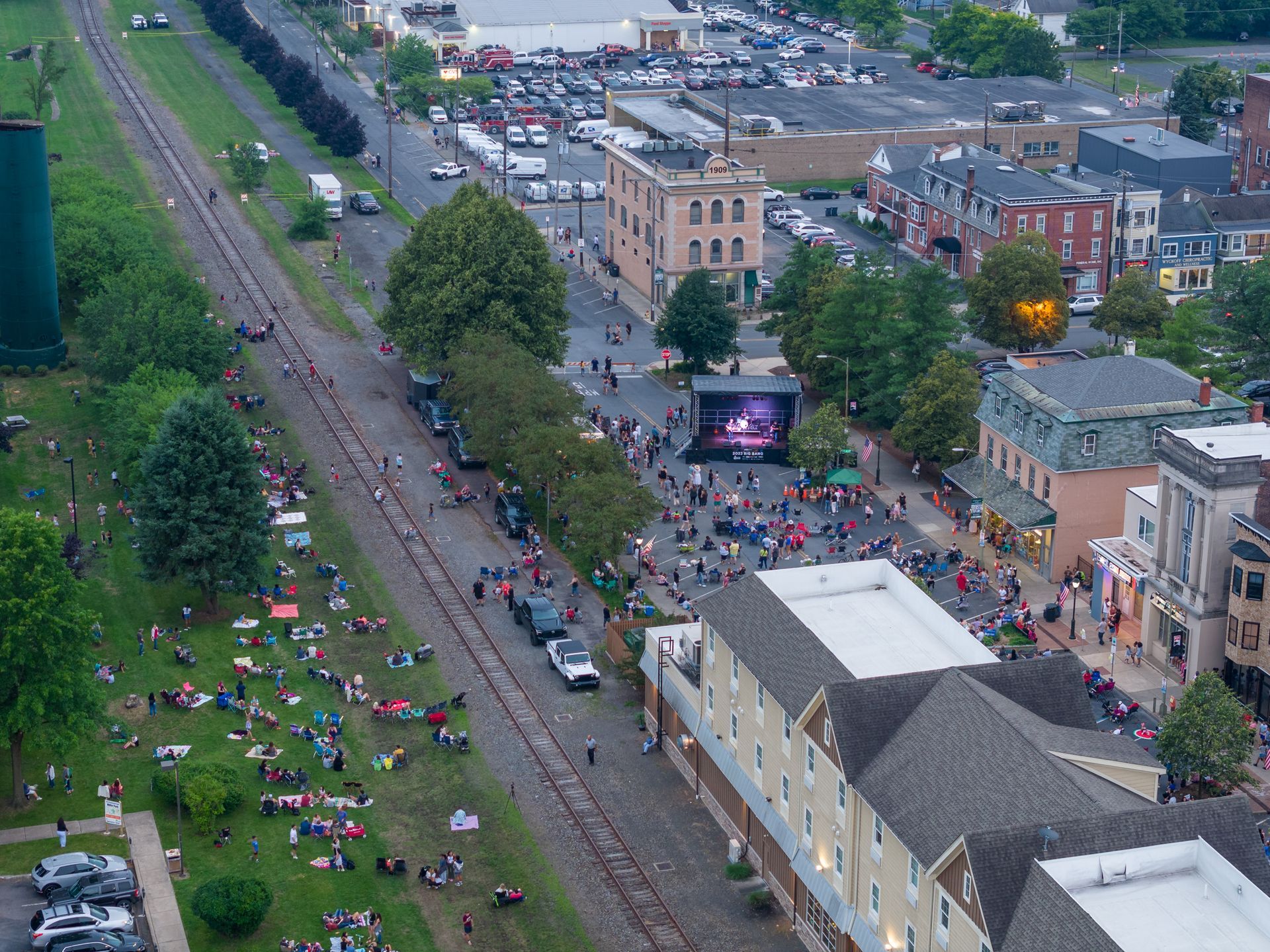 An aerial view of a city with a stage in the middle
