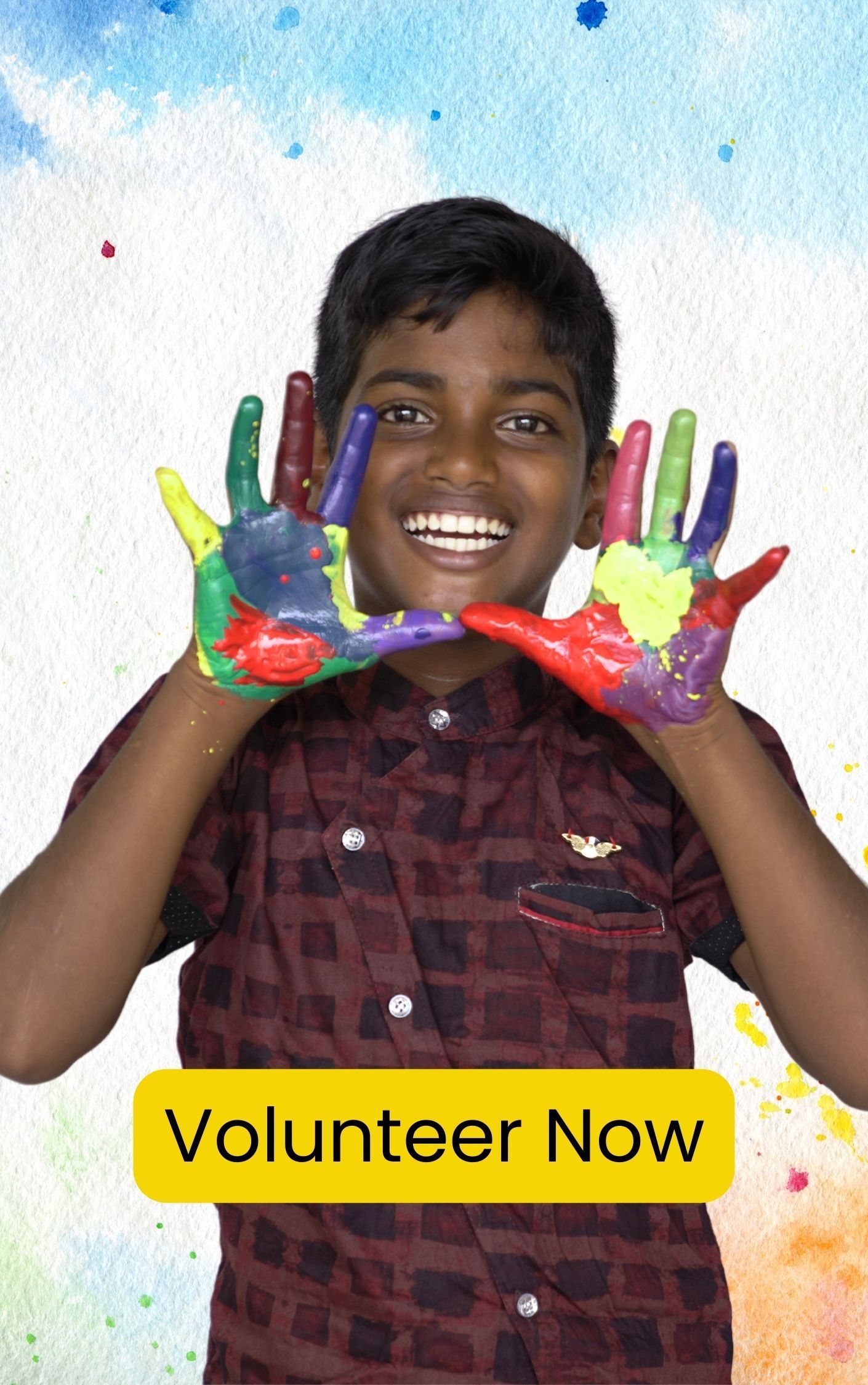 A young boy with his hands painted in different colors.