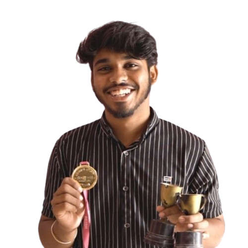 A man in a striped shirt is holding a medal and a cup