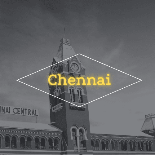 A black and white photo of a clock tower in chennai.