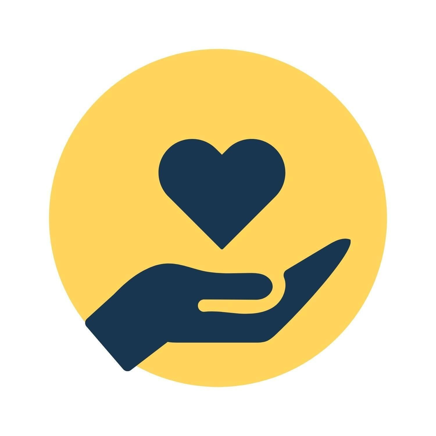 a hand holding a heart