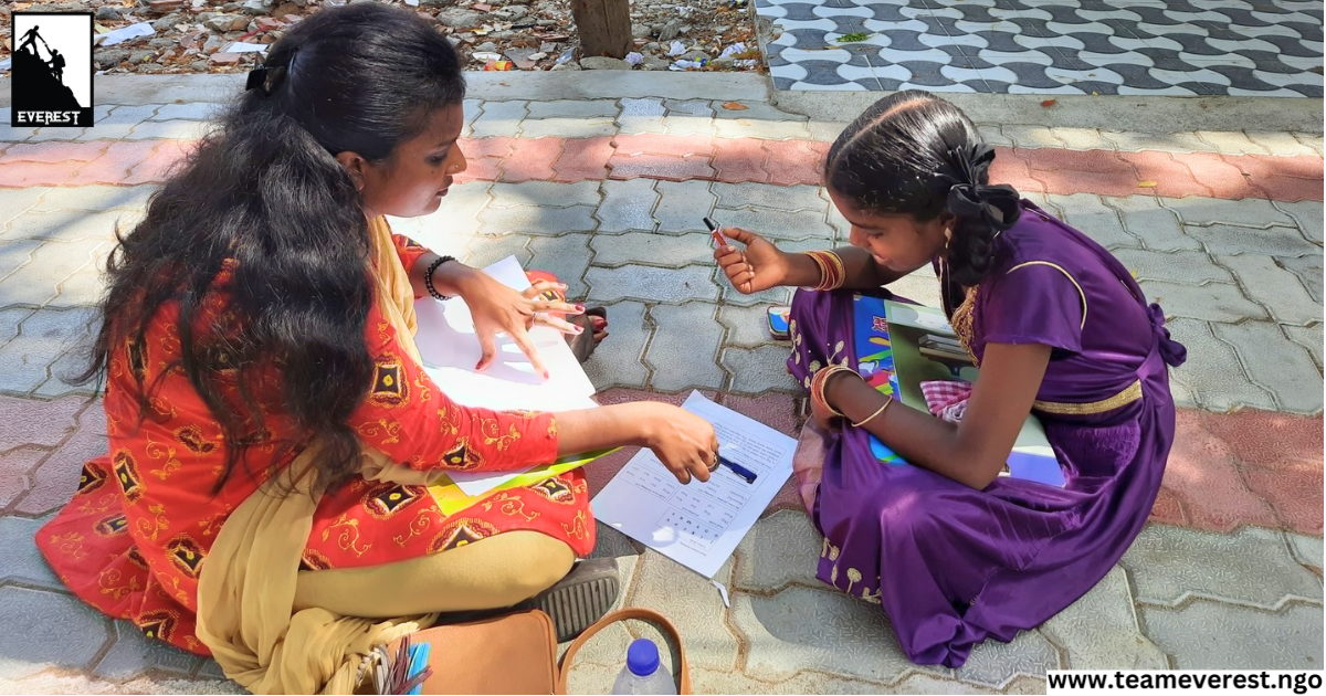 volunteer teaching a child