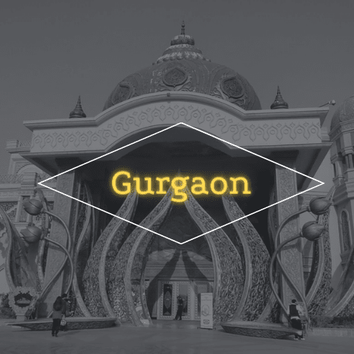 A black and white photo of a building that says gurgaon