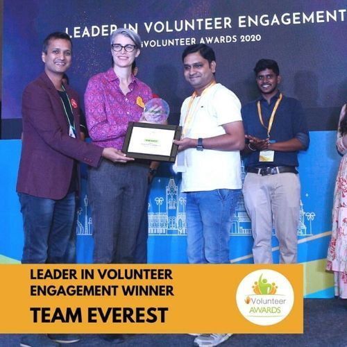 Karthee Vidya receiving Leader in Volunteering Engagement Award