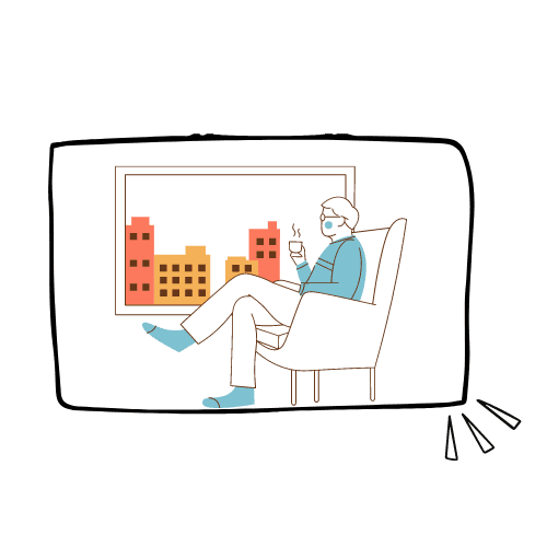 A man is sitting in a chair looking out a window.