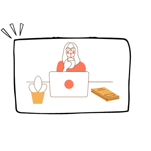 A woman is sitting at a desk using a laptop computer.