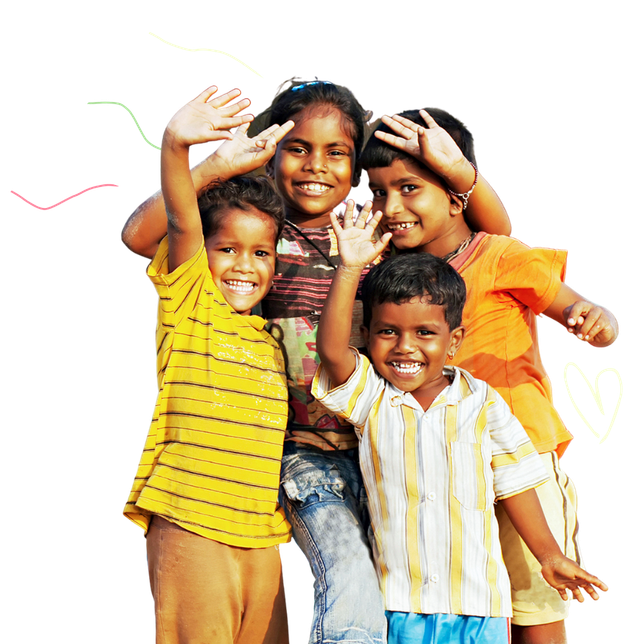 Four happy children waving
