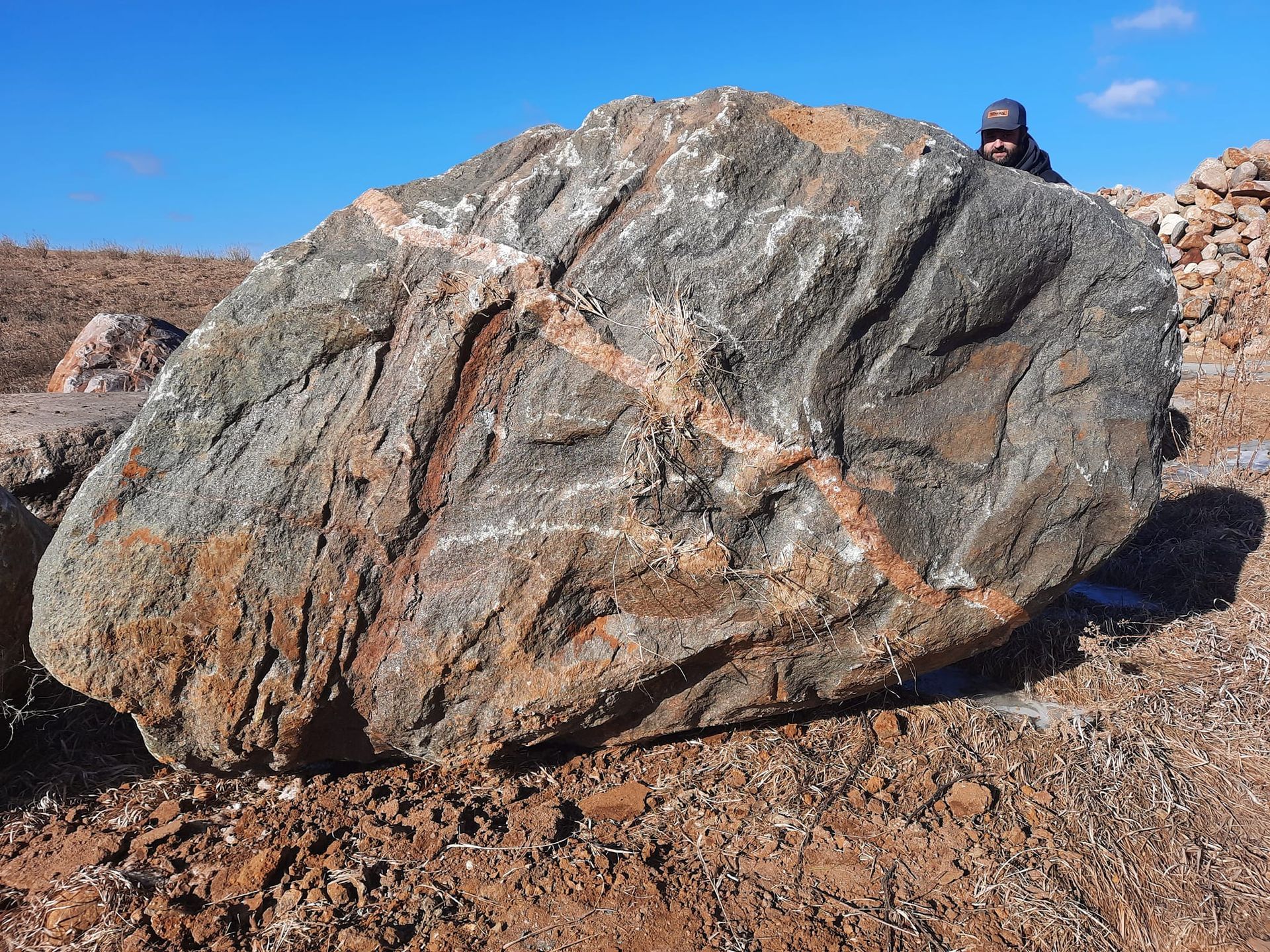 Extra-large decorative granite boulder for commercial and residential landscaping in Larchwood, Iowa