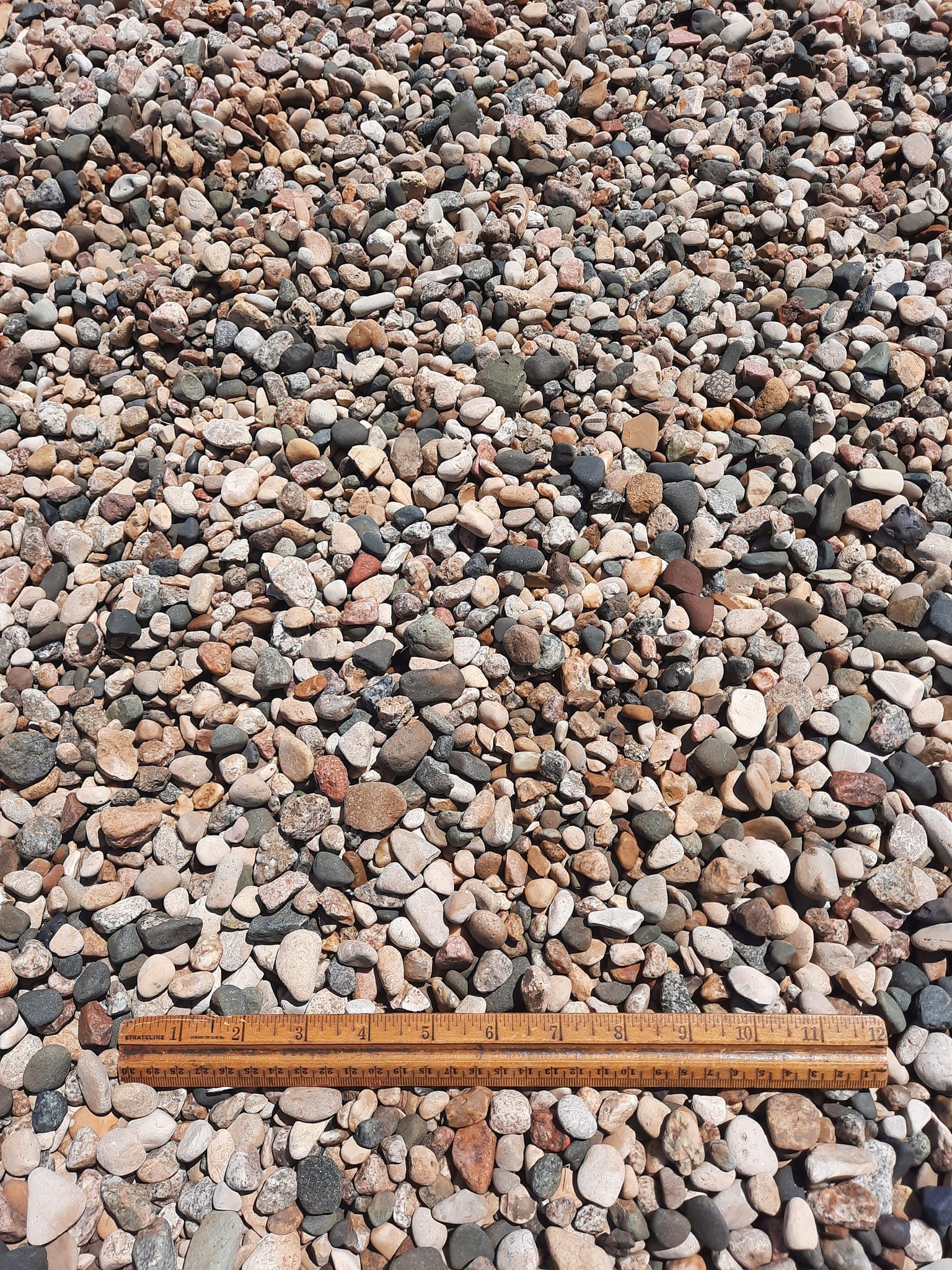 Pea gravel and small decorative stone available from Stensland Gravel in Larchwood, Iowa