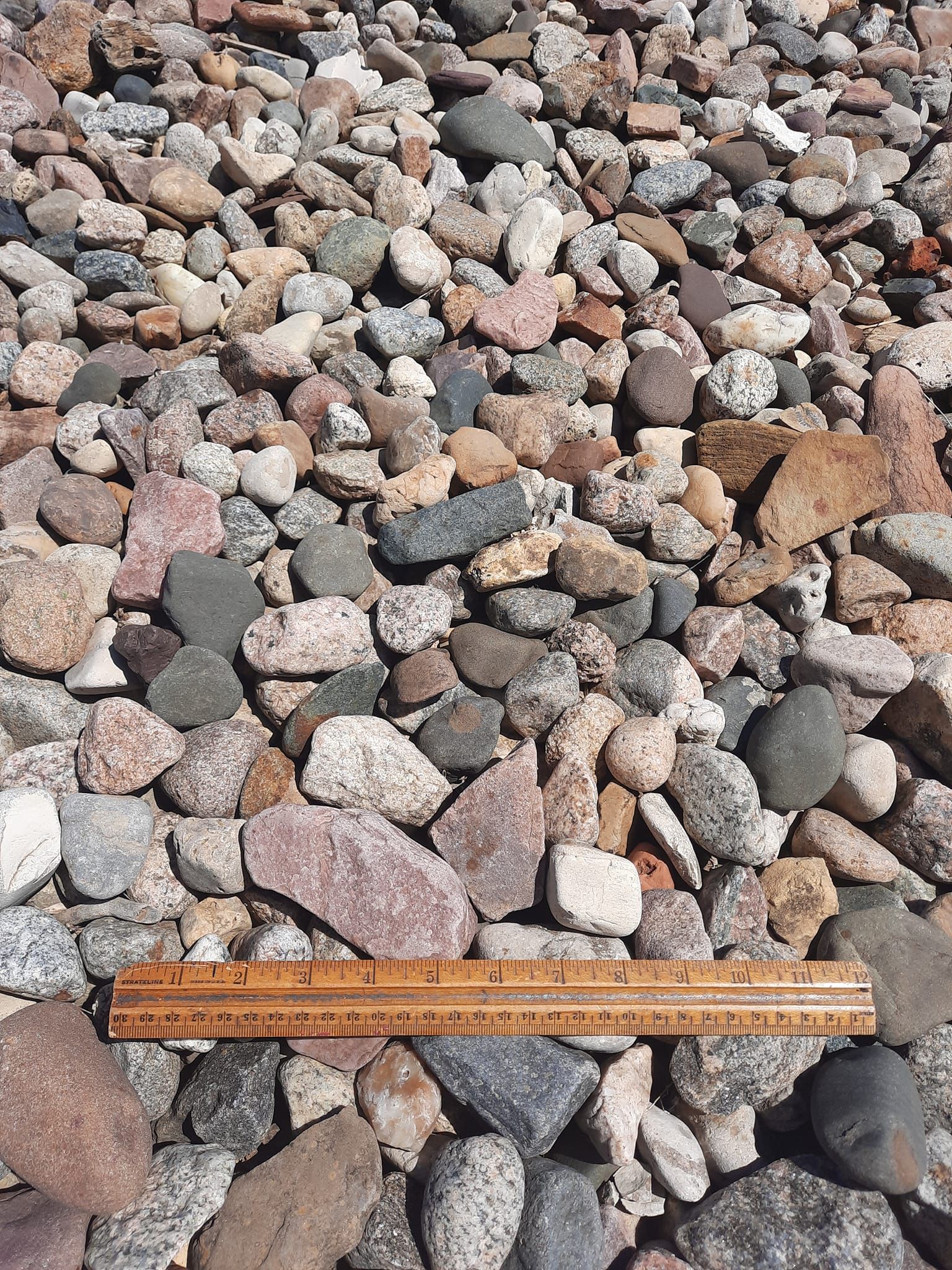 1 to 3 inch decorative river rock available from Stensland Gravel in Larchwood, Iowa