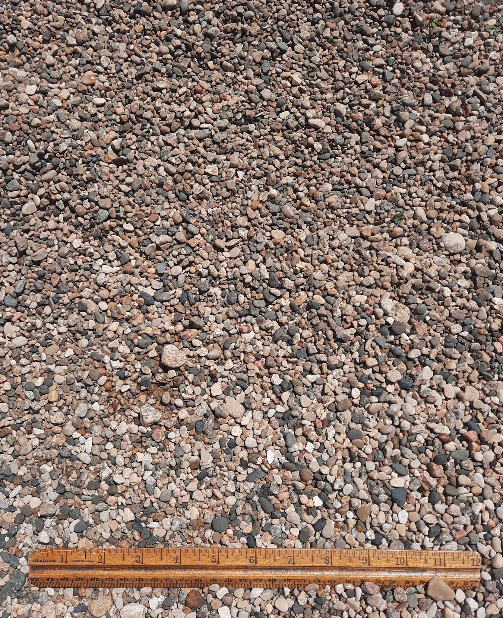 Large stockpile of decorative river rock available in Larchwood, Iowa