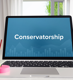 A laptop with the word conservatorship on it