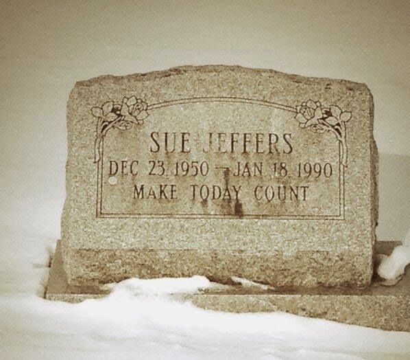 A gravestone for sue jeffers sits in the snow