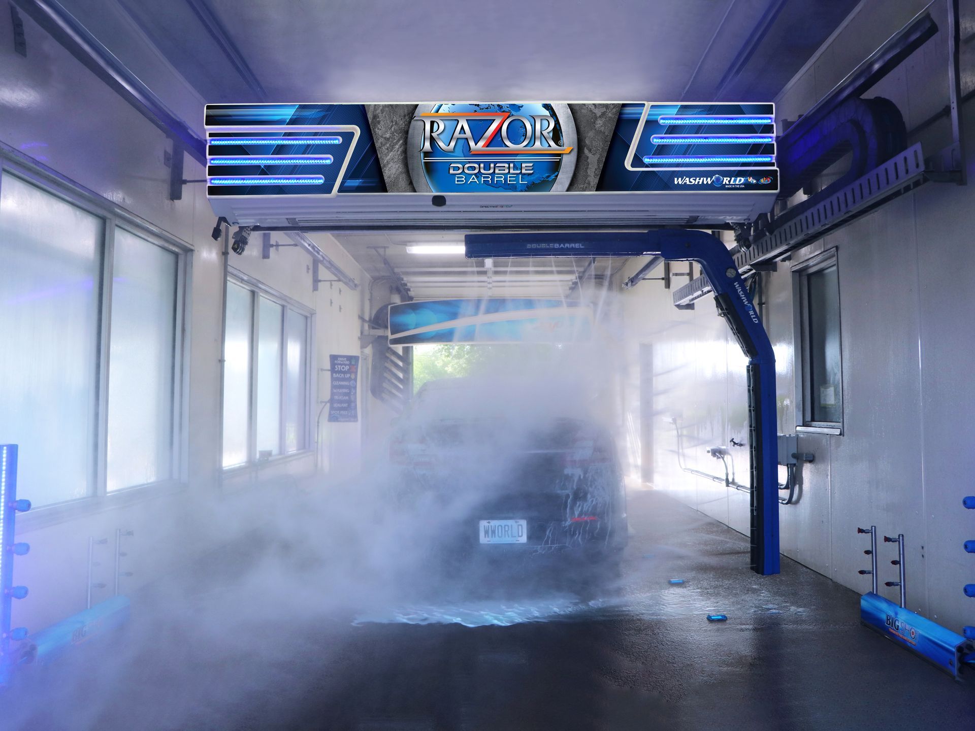 Car being washed inside a Razor car wash bay.