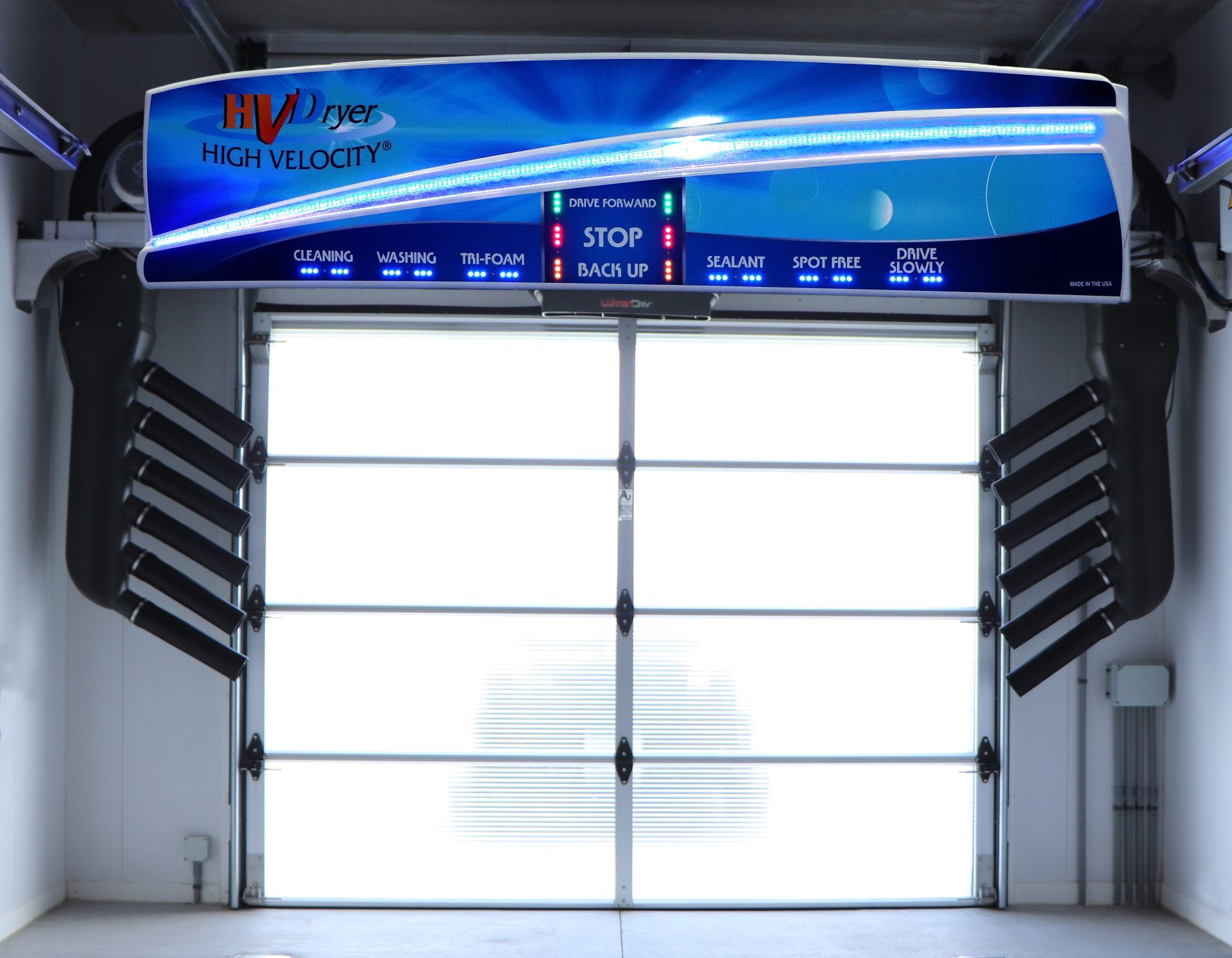 A lit up Dryer Cover with Instruction signage