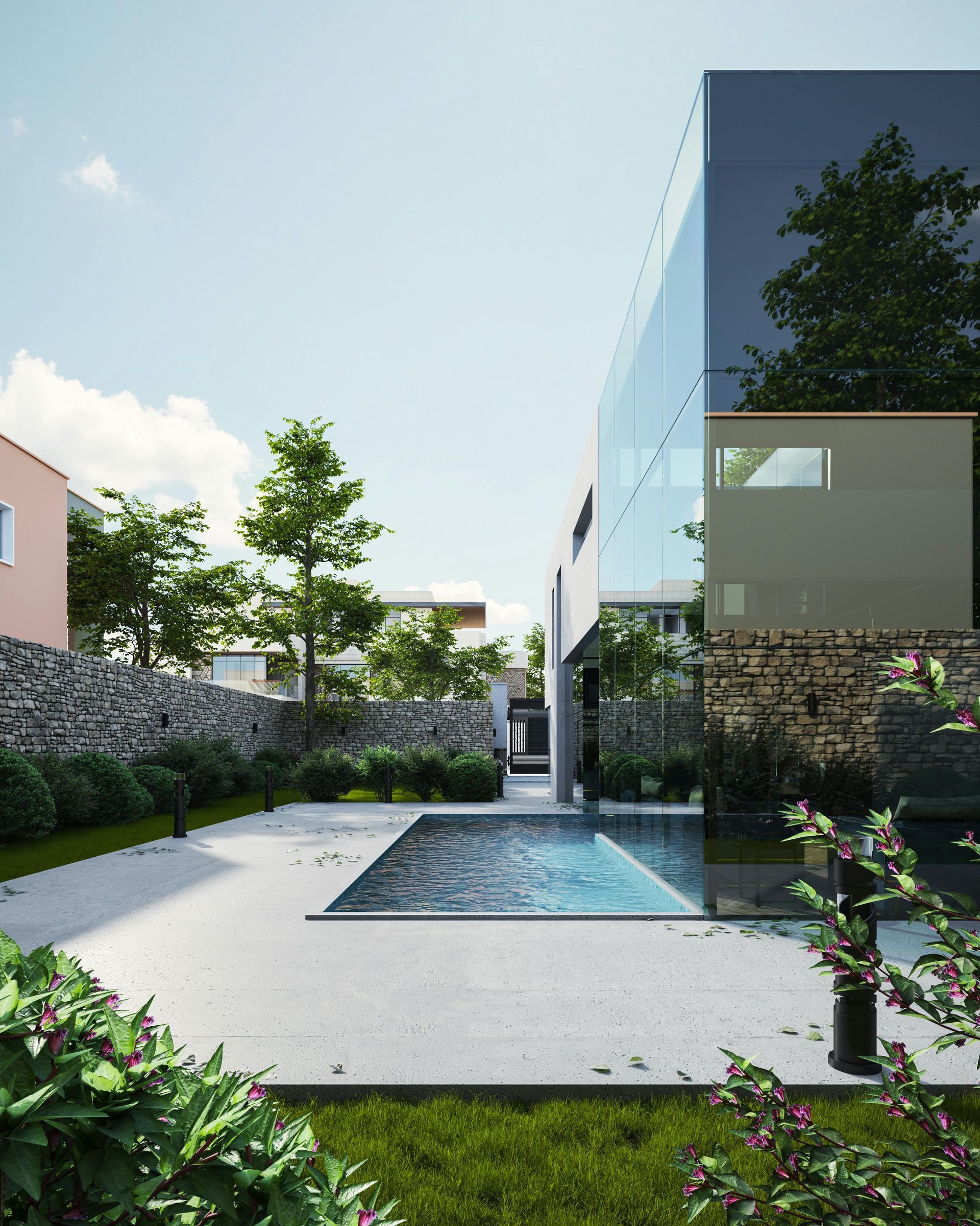 A large building with a swimming pool in front of it