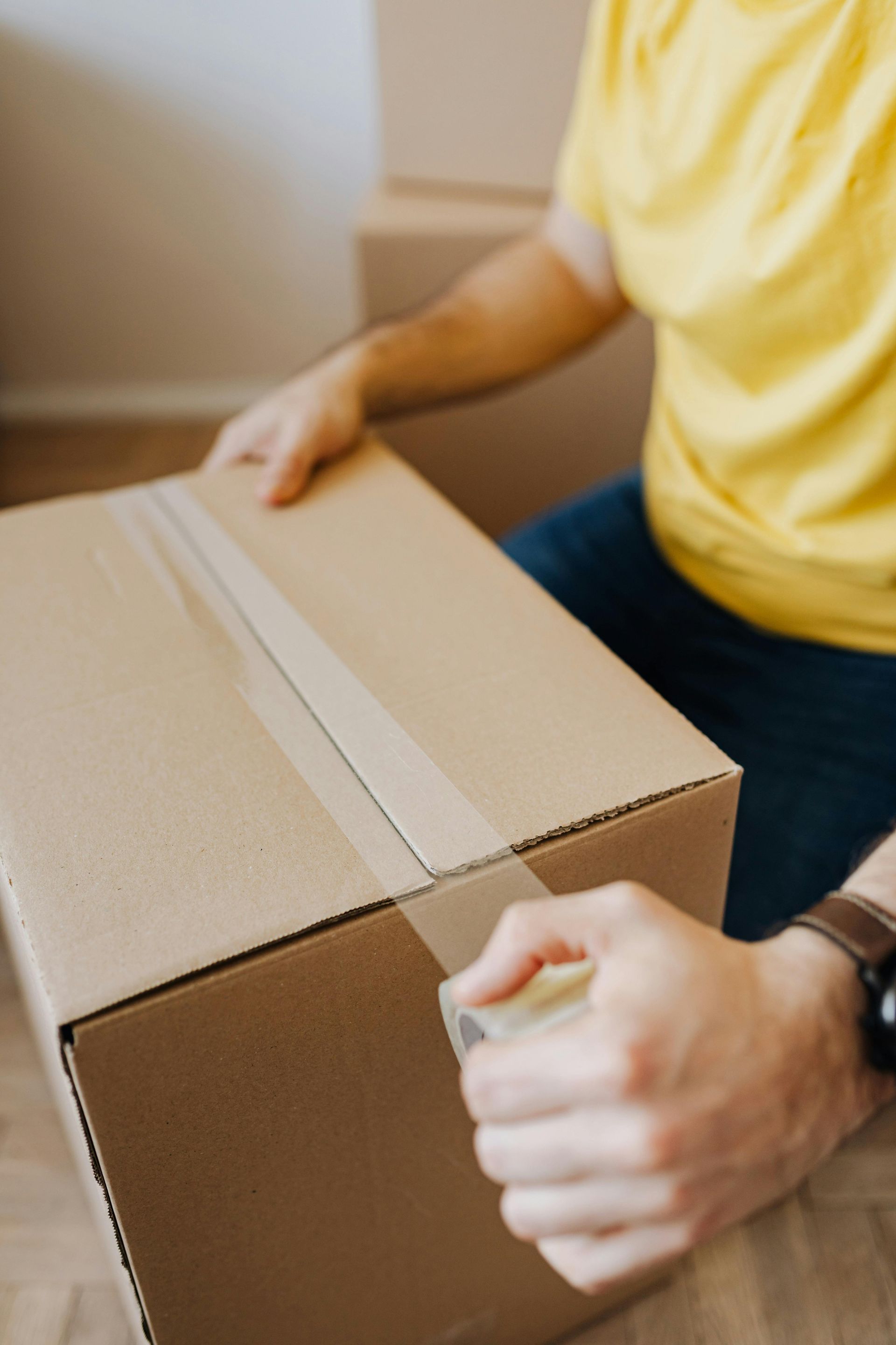 Packing up moving boxes – preparing for a big move or transition into a new home