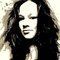 Woman with dark, wavy hair, looking forward. Black and white, slightly blurry.