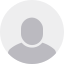 Silhouette of a person inside a gray circle.