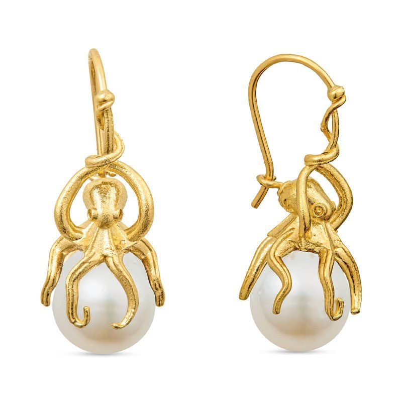 A pair of gold octopus earrings with pearls