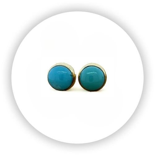 Turquoise stud earrings set in gold, on a white background.