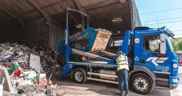 rf recycling skip lorry unloading at local site