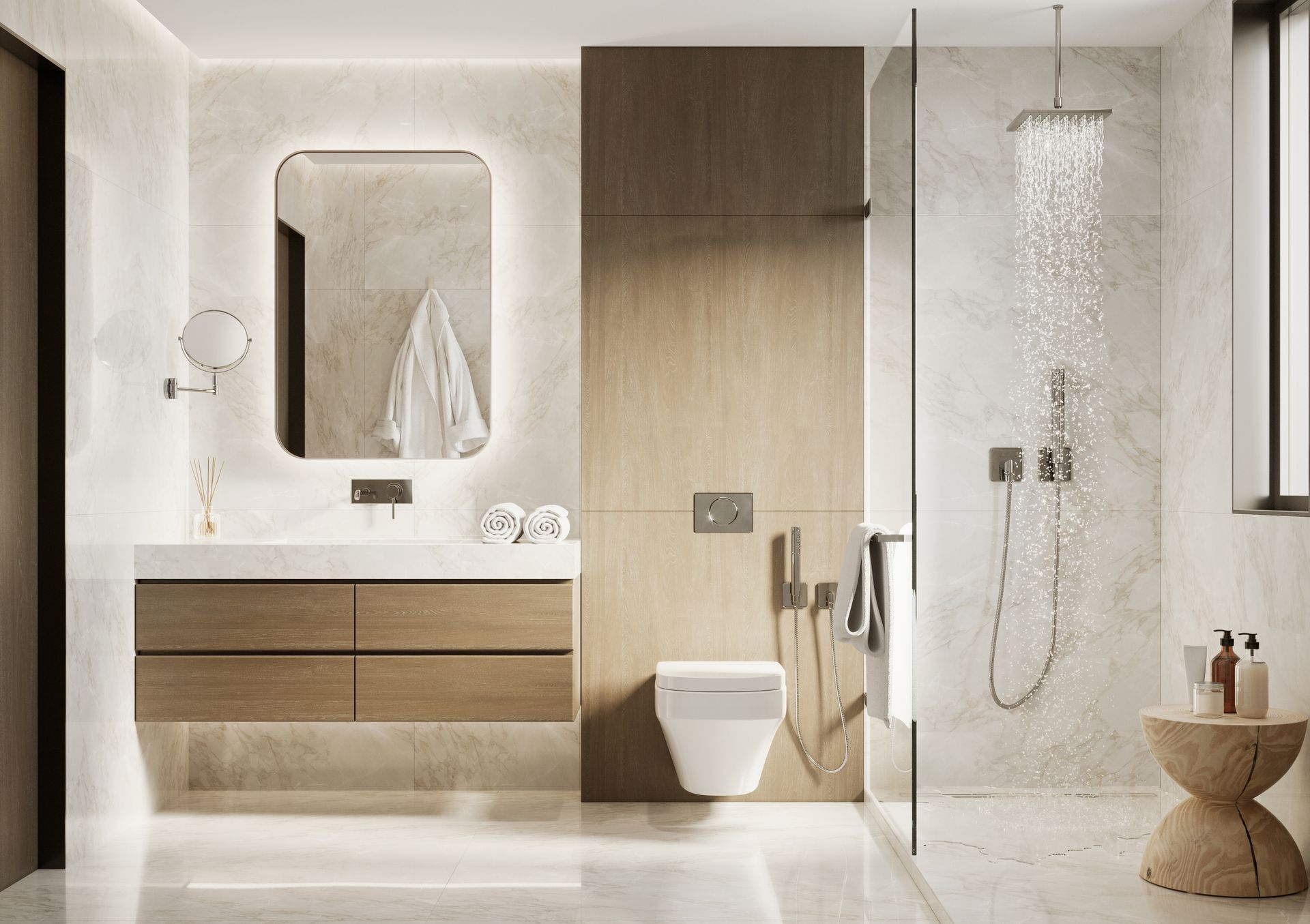 Modern bathroom with floating wooden vanity, lighted mirror, glass shower, and marble flooring.