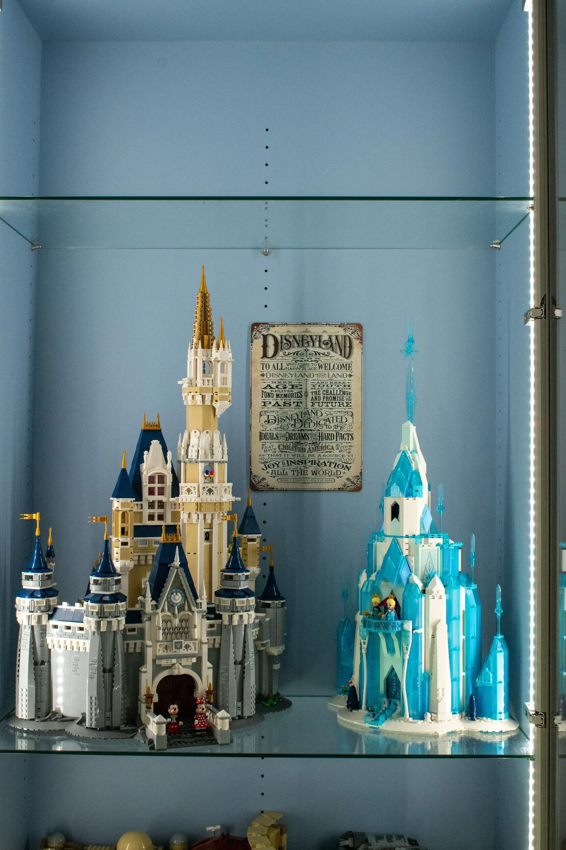 A display case filled with lego castles and ice castles.