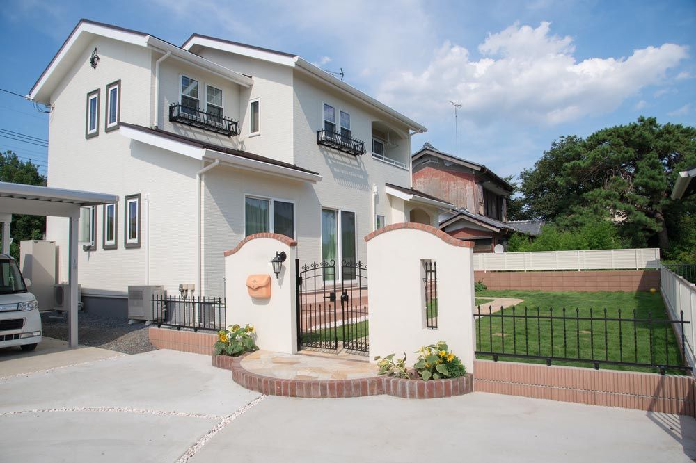 A White House With A Mailbox On The Side Of It — Professional Painters in Lennox Head, NSW