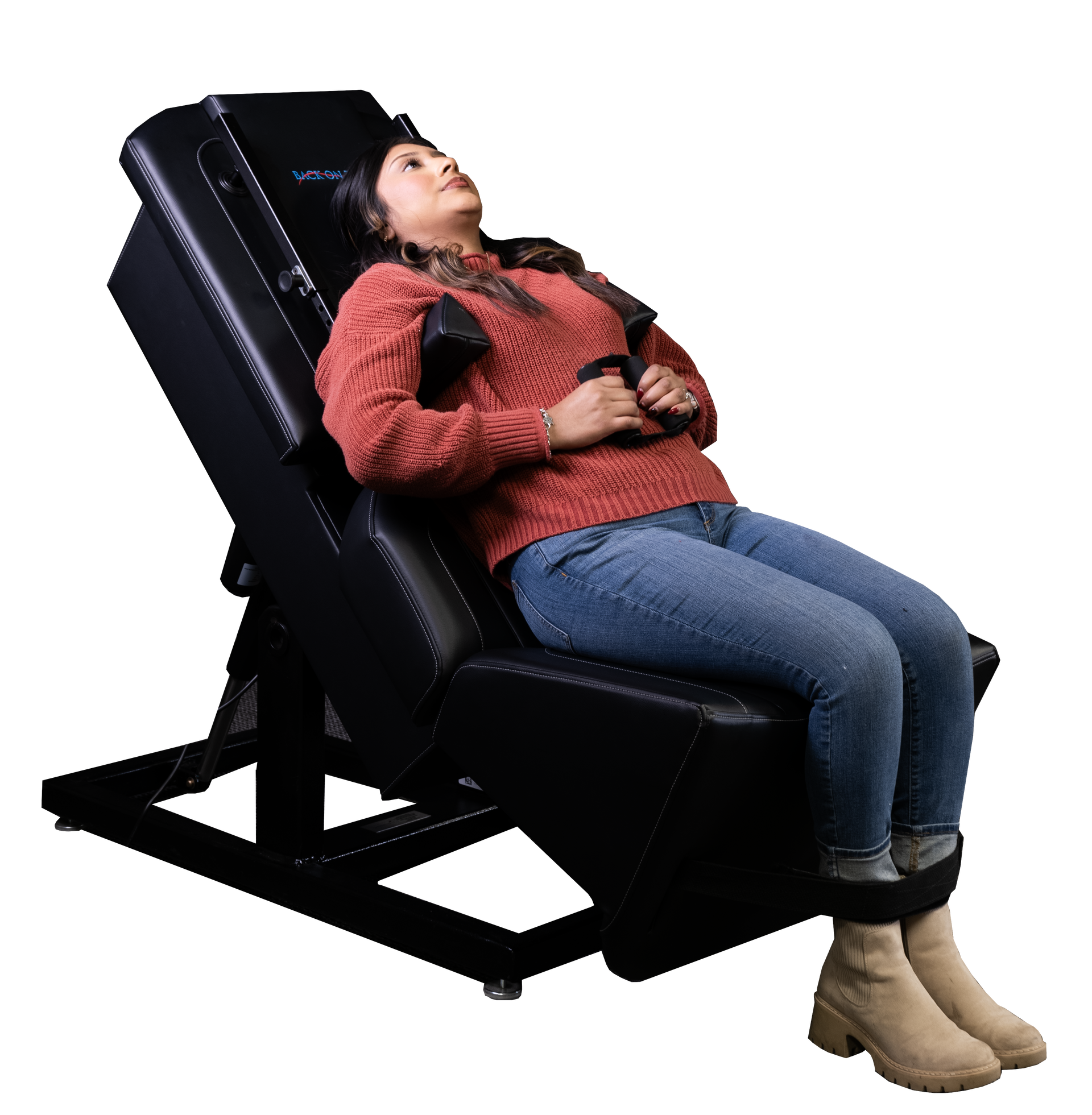 A woman is sitting in a chair with her legs crossed.