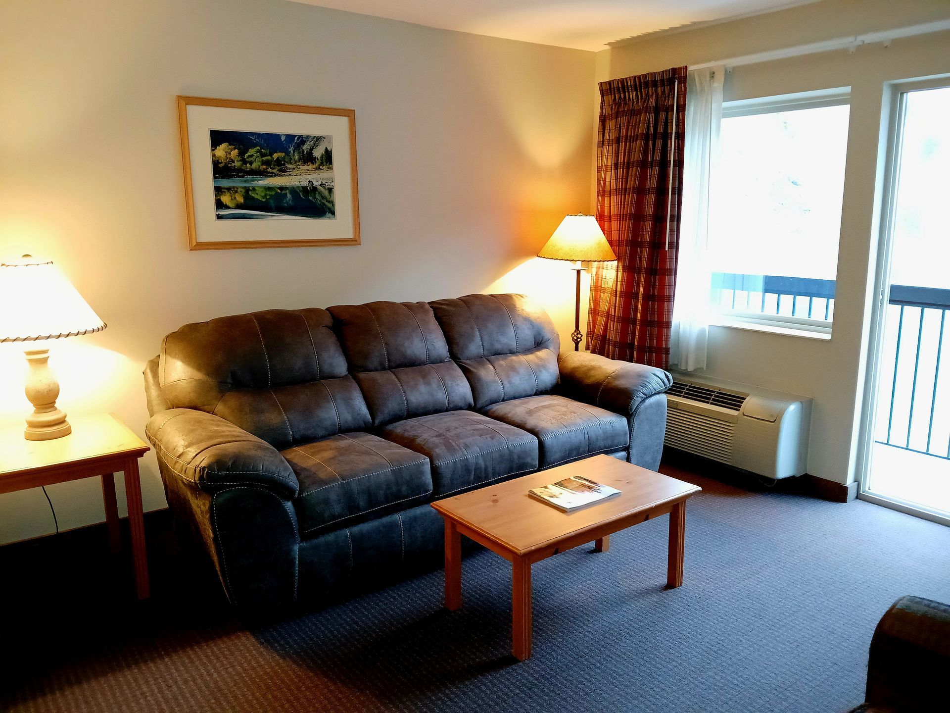 A living room with a couch and a coffee table