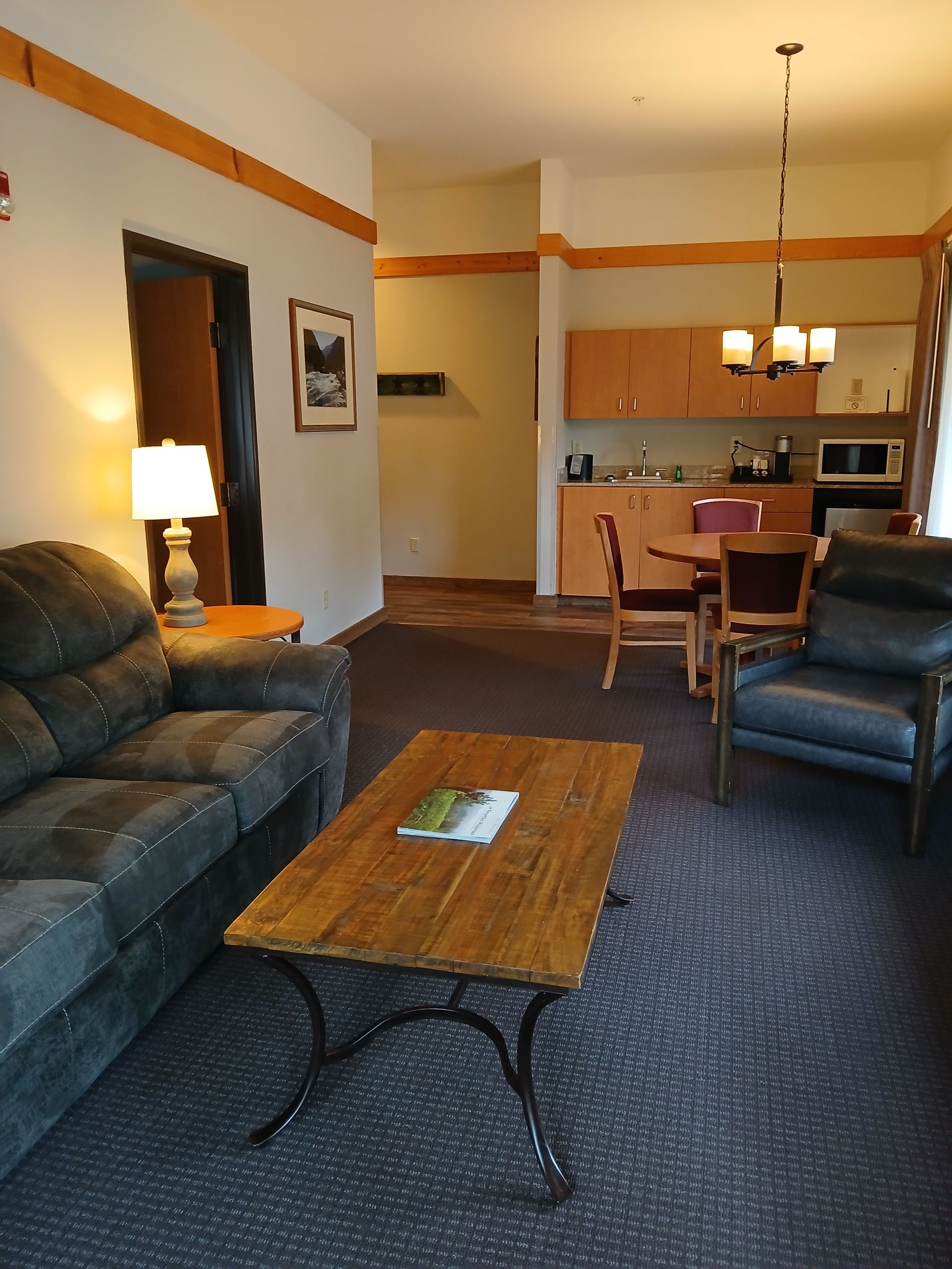 A living room with a couch and a coffee table