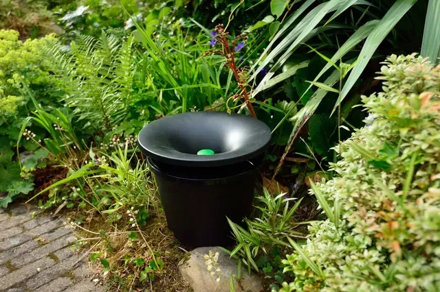 Mosquito Trap Discreetly in flowerbeds